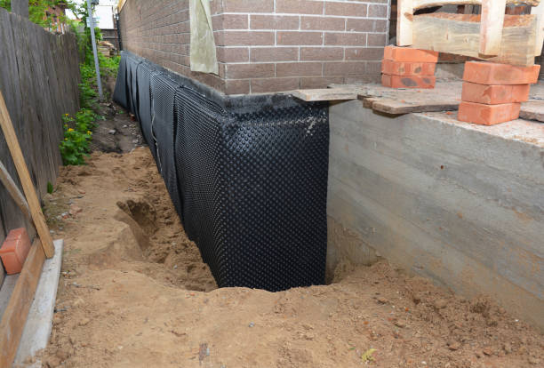 SJ Waterproofing Pros technician performing targeted Waterproofing assessment in Sugar Grove, OH